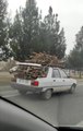 BAGAJI VE TAVANI ODUN YÜKLÜ OTOMOBİLLE TEHLİKELİ YOLCULUK