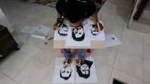 Malaysian teacher draws 5 portraits simultaneously with his hands, feet and mouth