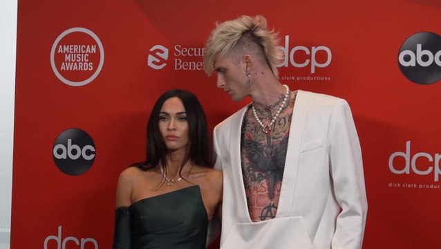 Megan Fox & Fiancé Machine Gun Kelly Snuggle Up At NHL All-Stars Game In Las Vegas
