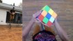 Person Solves Giant Rubik's Cube On Five Foot Unicycle