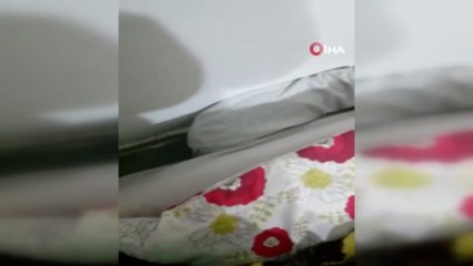 Polise yakalanmamak için kanepe ile duvar arasına saklandı