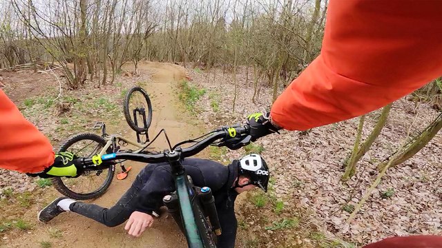 ''Hit by a tree & squashed by a cycle' Rider giggling in pain after INSANE trail biking fail'