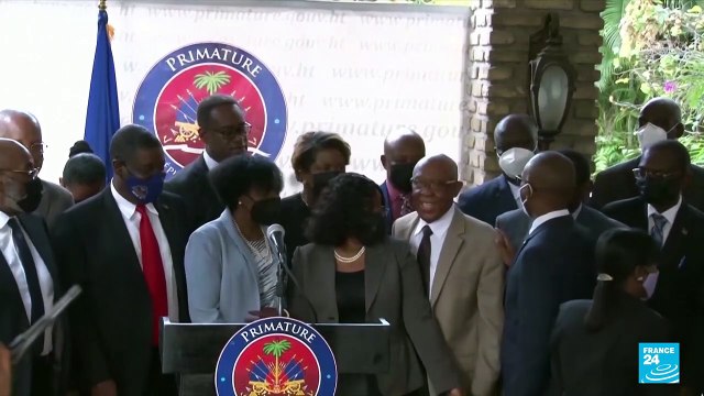 Haiti's Henry urges elections amid calls for transition government