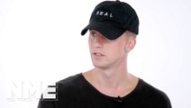 Michigan rapper NF AKA Nathan Feuerstein on being diagnosed with OCD, his Top 5 Eminem songs, religion, therapy and pipping Chance the Rapper to the top spot on Billboard