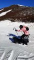 Snowboarder and Skier Work Together to Make Human Sled