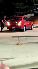 Guy Jumps on Car and Smashes Window