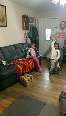 Toddler Twirls to the Floor