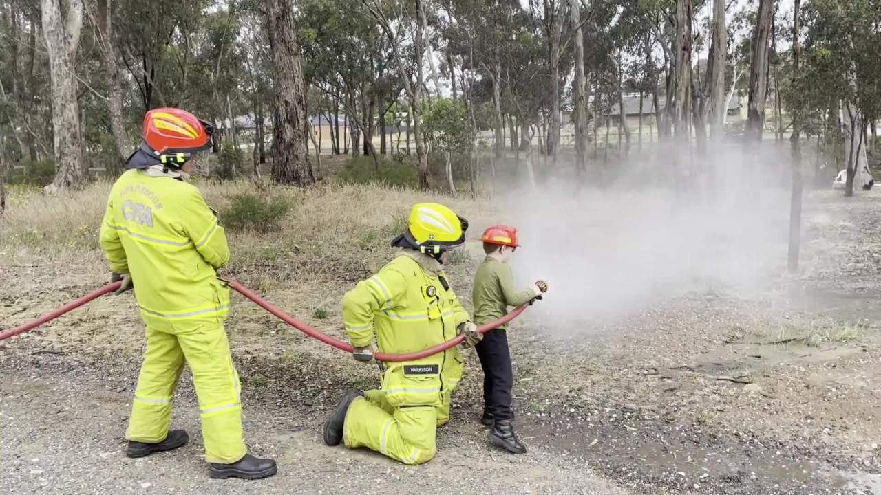 Jackson Plowright learns to put out a fire