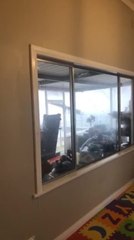 Shelley Johnston films the rain coming in at Lalahooli between Carroll and Breeza.