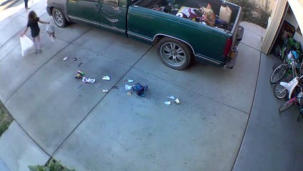 Security Cam Captures Trash Bag Blunder