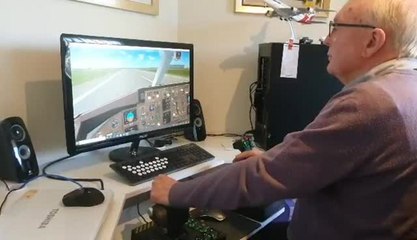 Port Macquarie resident Brian Birmingham with his flight simulation