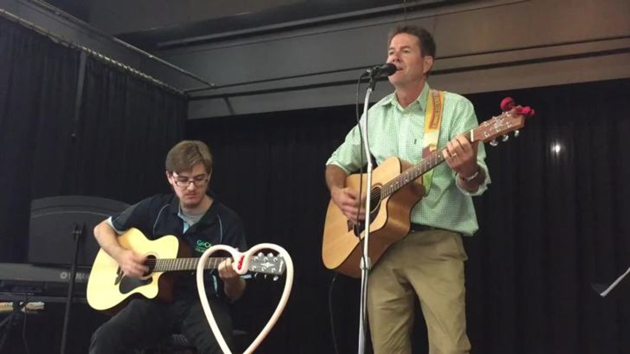 GoCo's Dominic Goodwin-Hawkin and Tamworth MP Kevin Anderson perform during Gunnedah's Senior's Festival