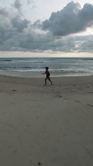 Playing on the beach in aceh jaya which was hit by the tsunami in 2004