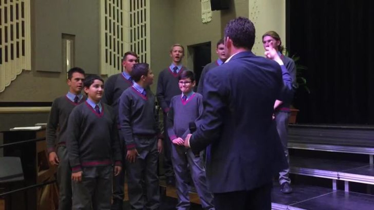 St Mary's choir baritone section with adjudicator Paul Jarman