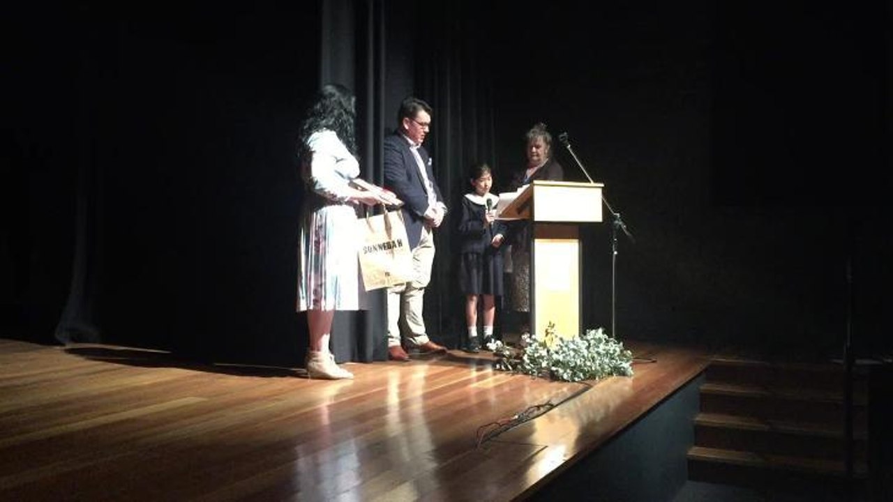 Amy Kwak reads her winning poem Autumn
