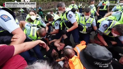 Clashes and arrests as New Zealand police clear Covid protest.