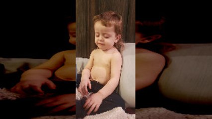 Child Struggles to Choose Between Sleep and Snacks