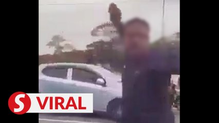Police say man seen behaving aggressively at traffic light is undergoing psychiatric treatment