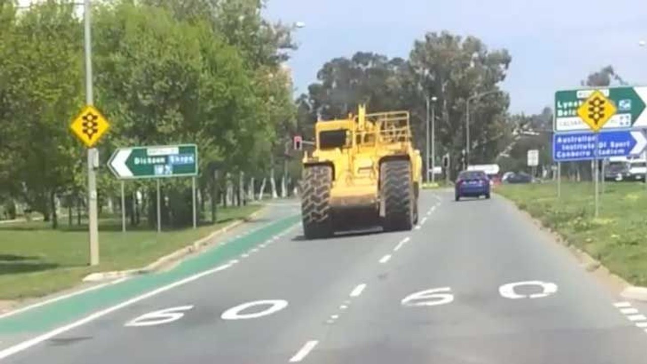 RAW VISION: Road scraper's joyride through Canberra caught on camera
