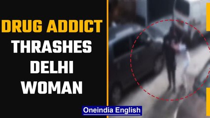 Delhi man thrashes a woman, beats her with a stick | Watch Viral Video | OneIndia News