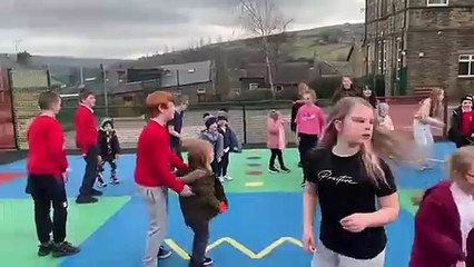 Children at New Road Primary School's danceathon for Ash Green School