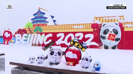 Snow blankets Beijing as Winter Games are held up