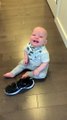 Boy Laughs About Making a Mess in Mom's Shoe