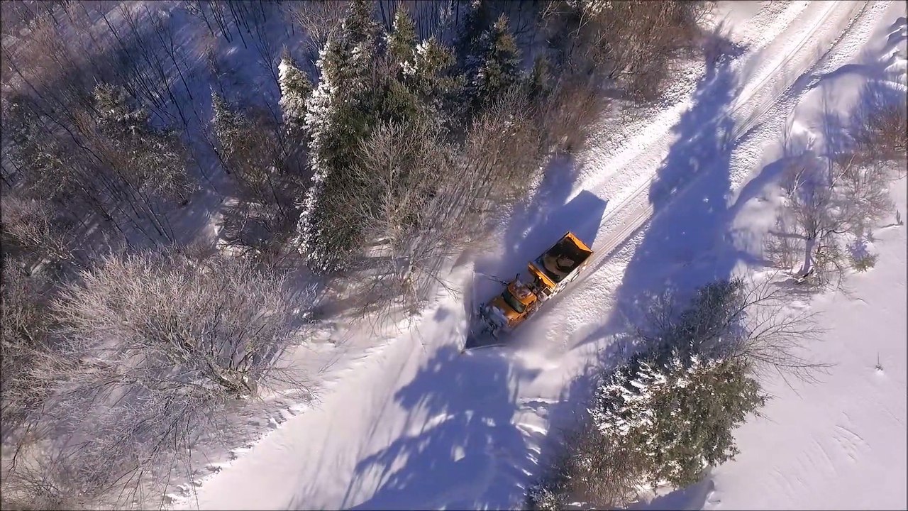 Snowplow Clears Deep Heavy Snow After Storm