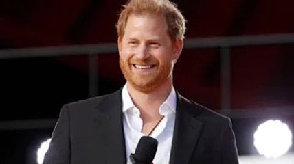 ‘Just lovely’ Prince Harry meets country superstar at Super Bowl while Meghan is a no show