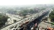 Endless rows of vehicles passing over Ashram flyover in New Delhi
