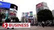 Japan's economy rebounds but Omicron clouds outlook