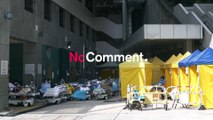 Overwhelmed Hong Kong hospitals set up outdoor wards