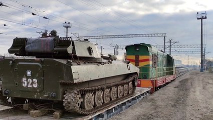 Russia releases videos showing some troops withdrawing from Ukraine border