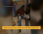 Guna ular soal siasat, polis Indonesia mohon maaf