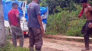 Pick up car stuck in the mud