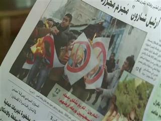 No Palestinian tears for Sharon as they watch funeral