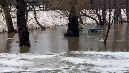 Flood and freeze threats combine near the Great Lakes