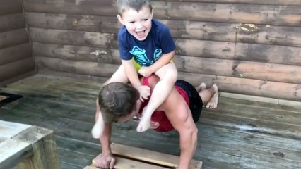 Gym-Mad Dad Works Out Using Kids As Weights | Happily TV