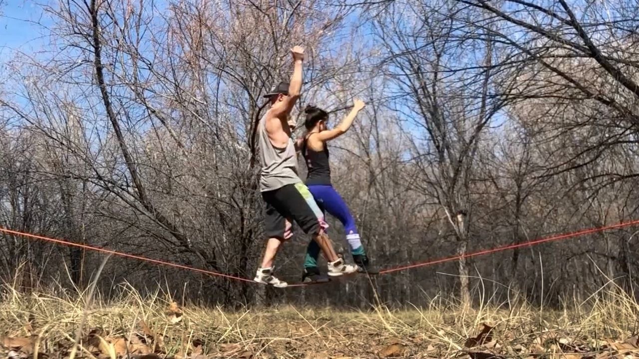Duo Perform 'Ballroom Dancing' On A Slackline Happily TV video