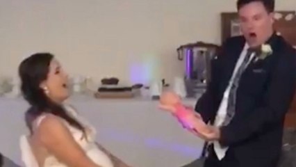 Groom's Hilarious Surprise For Pregnant Wife During Garter Toss | Happily TV