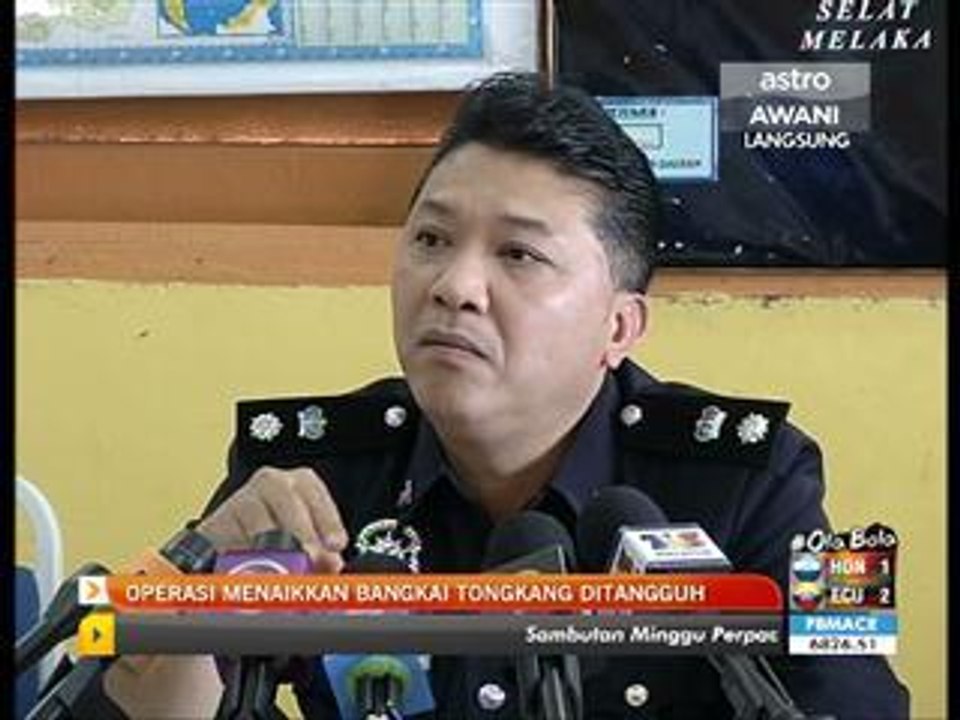 Operasi menaikkan bangkai tongkang tangguh