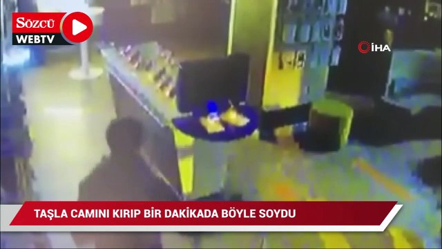 Taşla camını kırdığı telefon mağazasını 1 dakikada böyle soydu