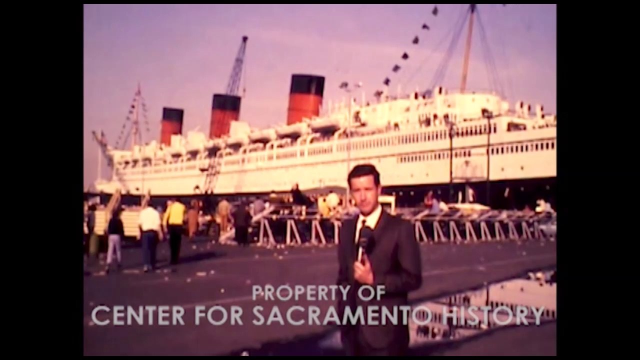 KCRASP028 Queen Mary settles in Long Beach