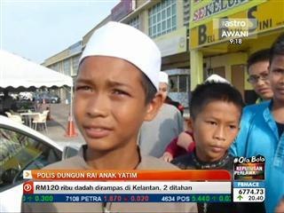 Polis Dungun rai anak yatim