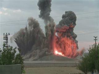 Air strike targets IS militants on a hill in Kobane