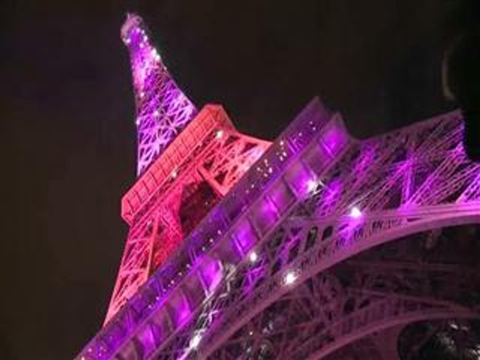 Eiffel Tower turns pink for breast cancer aware...