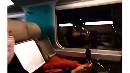 Ambient Backscatter communication experiment in a high speed train with businesscard size solar tag