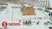 Shutterbugs spotlight ancient Great Wall after snowfall