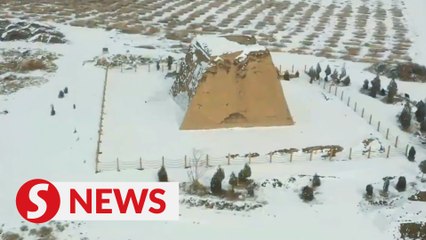 Shutterbugs spotlight ancient Great Wall after snowfall