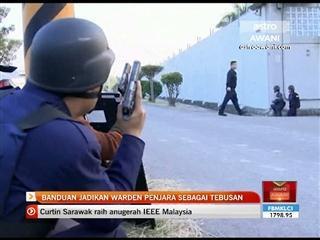 Banduan jadikan warden penjara sebagai tebusan